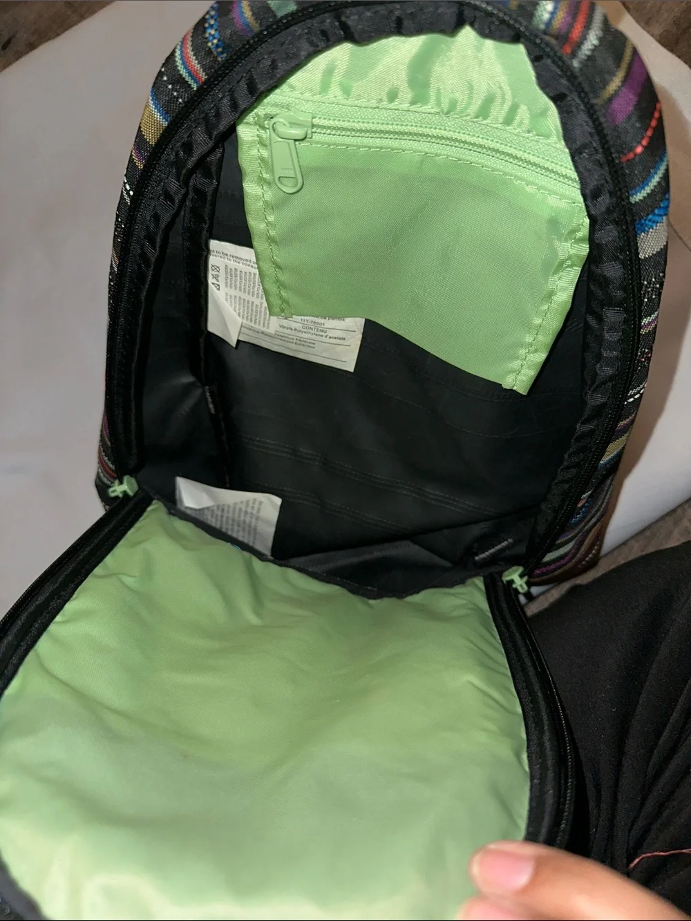 Dakine women’s Striped Backpack in Black, Blue, Purple, Green